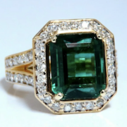 14K gold and diamond ring centered on a GIA-certified 5.12-carat emerald, estimated at $27,000-$32,000