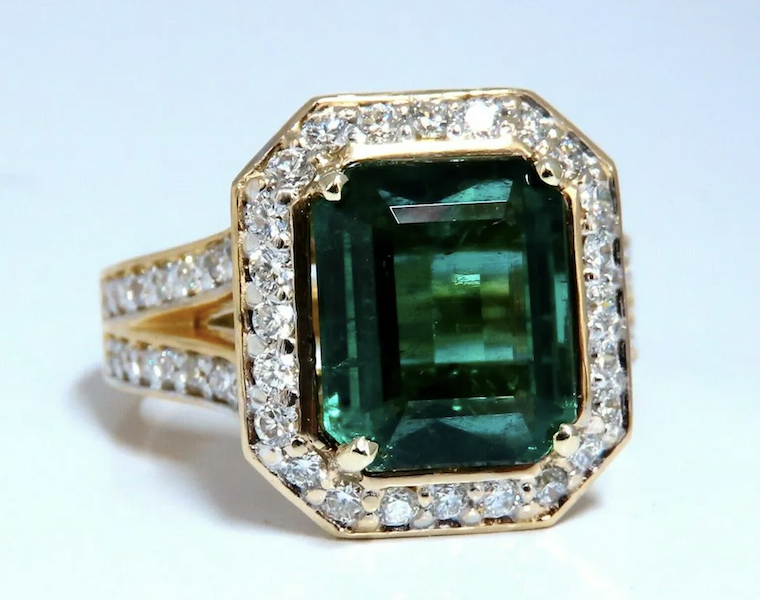 14K gold and diamond ring centered on a GIA-certified 5.12-carat emerald, estimated at $27,000-$32,000 