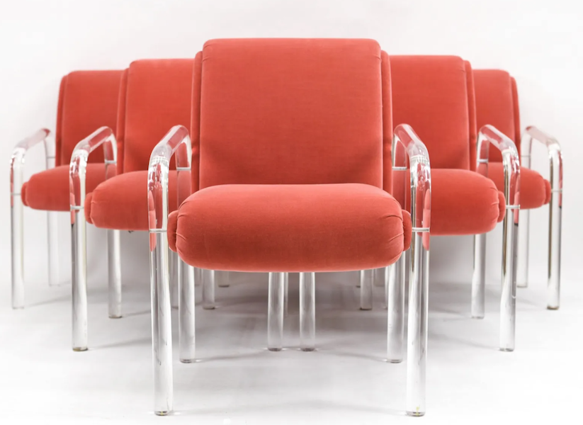 A group of six Lee Rosen Pace Lucite dining chairs, boasting a rich coral hue on its upholstery, sold for $1,700 plus the buyer’s premium in April 2021. Image courtesy of Westport Auction and LiveAuctioneers.