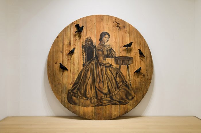 Whitfield Lovell, ‘Because I Wanna Fly,’ 2021. Conte on wood with attached found objects. 114 in. in diameter. © Whitfield Lovell. Courtesy of Virginia Museum of Fine Arts