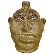 Lanier Meaders Big Head Face Jug, one of six face jugs by the late Georgia folk potter in the sale lineup, estimated at $800-$1,200