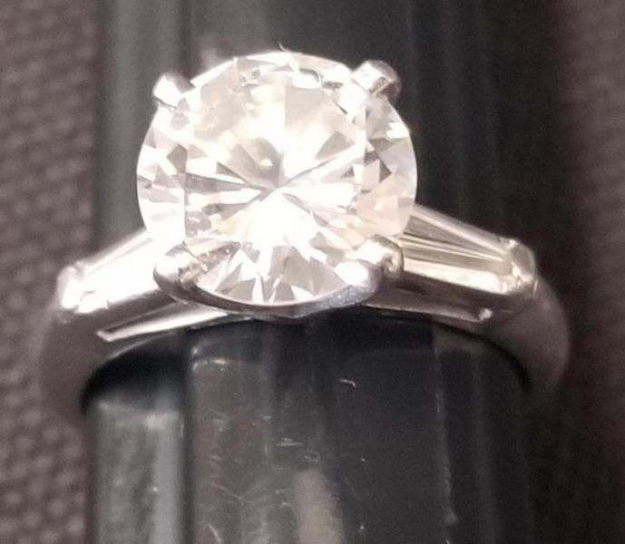 2.5-carat round I-J color VS-1 diamond in platinum ring, $12,600