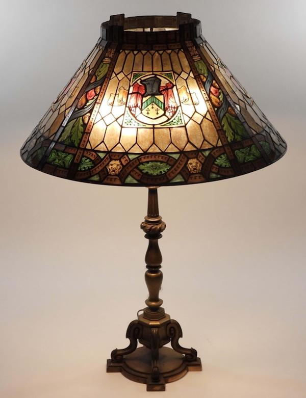 Early 20th-century Duffner & Kimberly heraldic armorial table lamp, estimated at $6,000-$9,000