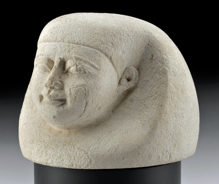 An ancient Egyptian carved limestone lid for a canopic jar realized $4,500 plus the buyer’s premium in October 2021. Image courtesy of Artemis Gallery and LiveAuctioneers