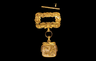 Large 18K Gold Rush ore engraved brooch, estimated at $10,000-$100,000, which California’s first millionaire, San Francisco businessman Samuel Brannan, was sending to his son in Geneva, Switzerland as a gift to the son's teacher. Photo credit Holabird Western Americana Collections