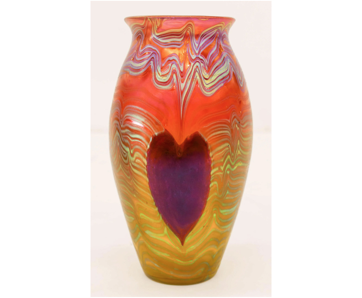 A Loetz Phaenomen iridescent glass heart vase earned $8,000 plus the buyer’s premium in December 2019. Image courtesy of MBA Seattle Auction and LiveAuctioneers.