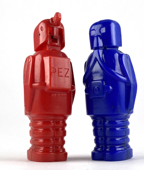 Rare PEZ plastic full-body robot dispensers, one blue, one red. Form originally produced in 1955 and one of the first designs released by the producers of PEZ. Height: 3 7/8in. Estimate for the pair: $400-$800