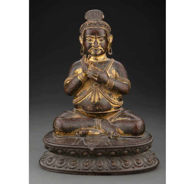 Tibetan gilt bronze Mahasiddha figure, estimated at $60,000-$80,000. Image courtesy of Heritage Auctions