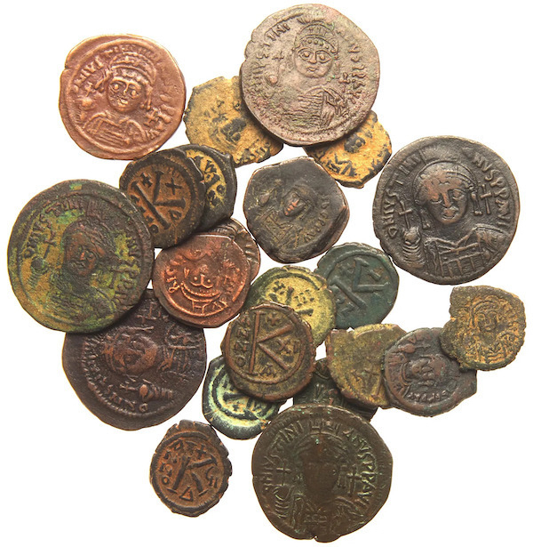 A 23-piece lot of Early Byzantine bronze coins realized $440 plus the buyer’s premium in February 2021. Image courtesy of Winner’s Auction LTD and LiveAuctioneers