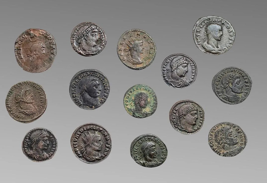 This lot of 14 Roman bronze coins dating between the 2nd to the 4th century A.D. together sold for $450 plus the buyer’s premium in December 2020. Image courtesy of Ira and Larry Goldberg Coins & Collectibles and LiveAuctioneers