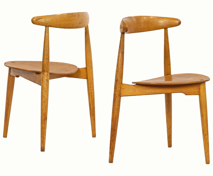 Two from a set of eight Hans Wegner Heart chairs, estimated in full at $4,200-$5,200