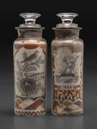 Pair of Andrew Clemens Sweetheart sand bottles, estimated at $60,000-$80,000