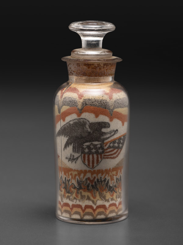 Early Andrew Clemens eagle sand bottle, estimated at $20,000-$40,000