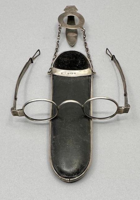 Pair of James Peters coin silver spectacles with a brown leather case, estimated at $300-$400