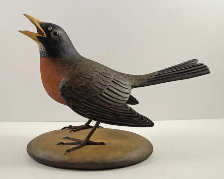 American Robin life-size wooden carving by Frank Finney, estimated at $3,250-$3,800