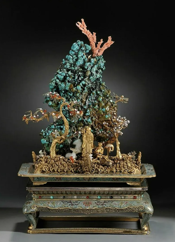 Qing dynasty, Qianlong era gilt and cloisonne sculpture of Mount Penglai Island, with carved hardwood and glass display case, estimated at $7,500-$10,000