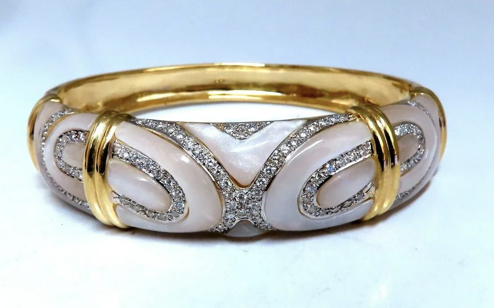 18K gold, carved mother-of-pearl and diamond bangle bracelet, estimated at $12,000-$14,000 
