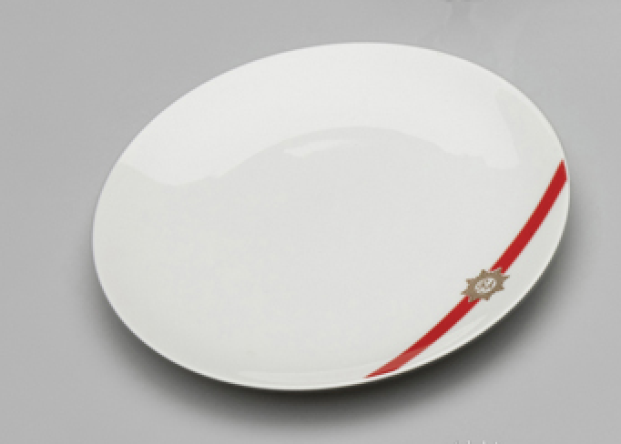 Plate from TWA (Trans World Airlines) Royal Ambassador first-class meal service set, 1960s–mid-1970s, gift of TWA Clipped Wings International.