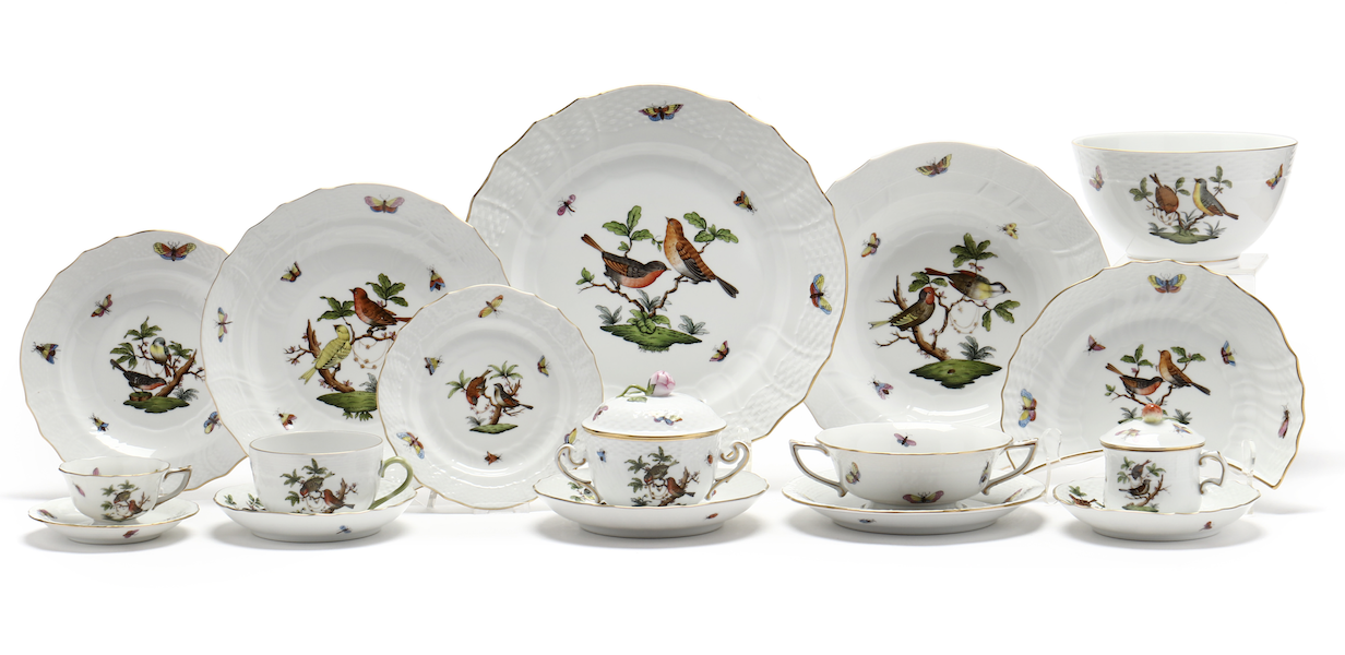 224-piece porcelain dinner service in Herend’s Rothschild Bird pattern, estimated at $50-$25,000