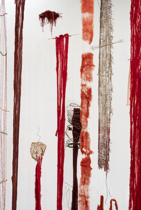 Cecilia Vicuna, ‘Quipu del Exterminio / Extermination Quipu,’ 2022. Wool, natural plant fibers, horse hair, metal, wood, seashells, nutshells, seeds, bone, clay, plaster, plastic and pastel, dimensions variable. Solomon R. Guggenheim Museum, New York, purchased with funds contributed by the Latin American Circle and through prior gifts of Sibyl H. Edwards, Thomas Messer, and Mr. and Mrs. Allan D. Emil 2022.31. © Cecilia Vicuna. Photo credit: David Heald © Solomon R. Guggenheim Foundation.