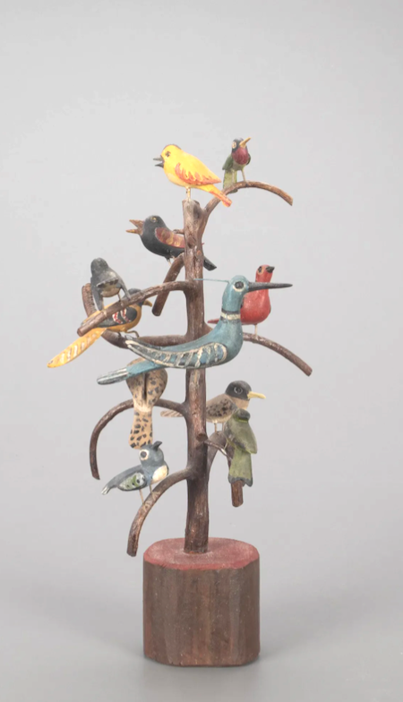 A circa-1990 Frank Finney folk art bird tree, featuring 11 birds, attained $27,500 plus the buyer’s premium in July 2022. Image courtesy of Copley Fine Art Auctions and LiveAuctioneers.