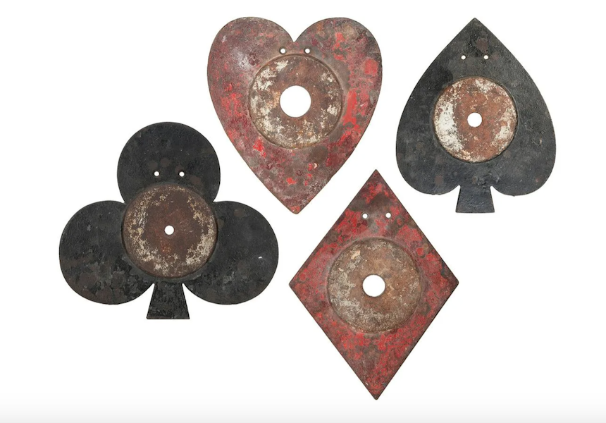 An H.W. Terpening set of shooting gallery targets in the familiar shapes of suits from playing cards realized $10,000 plus the buyer’s premium in April 2022. Image courtesy of Potter & Potter Auctions and LiveAuctioneers.