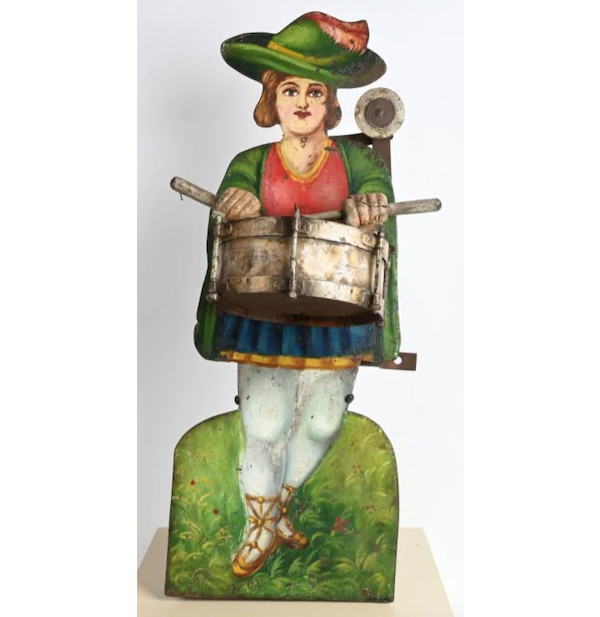 An exceptionally well-preserved 1880s hand-painted iron shooting gallery target, resembling a woman drummer, sold for $22,500 plus the buyer’s premium in January 2021. Image courtesy of Milestone Auctions and LiveAuctioneers.