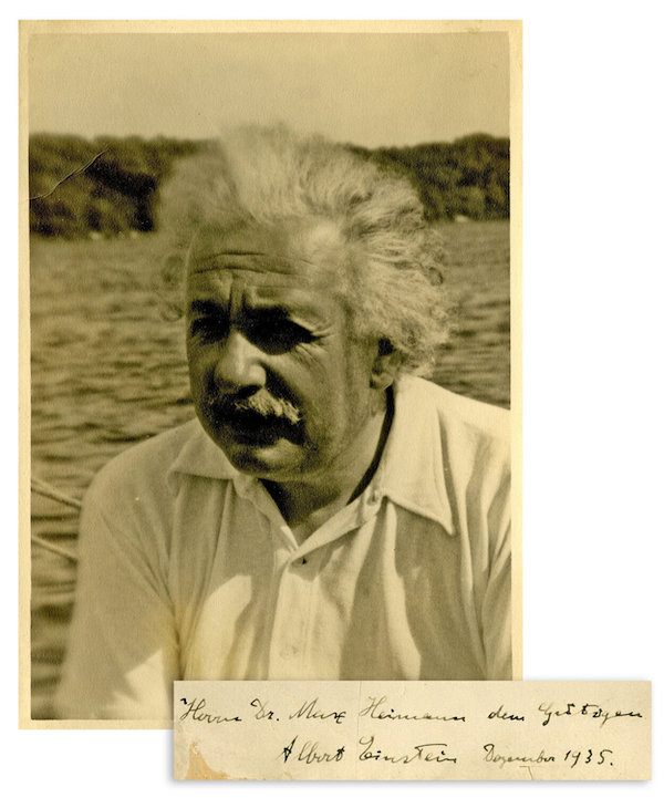 Photograph of Albert Einstein in yachting clothes, signed and inscribed by him in December 1935, estimated at $9,000-$12,000
