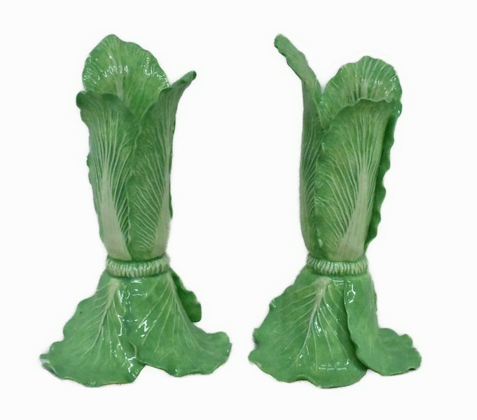 Signed pair of Dodie Thayer lettuce ware candlestands, estimated at $100-$1,000
