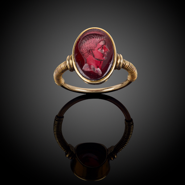 The garnet intaglio ring, which might feature a carved image of Augustus Caesar, first emperor of Rome, sold for £117,000, or about $145,000, after a bidding war that lasted more than 17 minutes. Image courtesy of Fellows