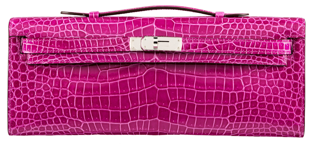 Hermes shiny rose Scheherazade crocodile Kelly Cut clutch, estimated at $26,000-$34,000. Image courtesy of Heritage Auctions ha.com