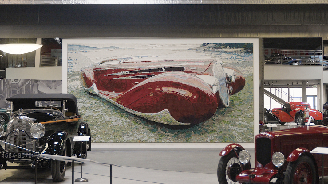 1939 Delahaye Type 165 tapestry by Keith Collins on display at the Mullin Automotive Museum in Oxnard, Calif. Image courtesy of the Mullin Automotive Museum