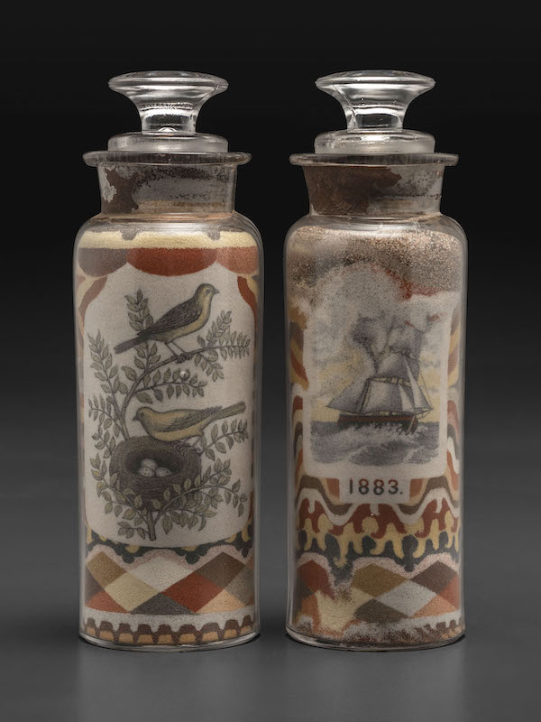 Pair of Andrew Clemens Sweetheart sand bottles, $151,200