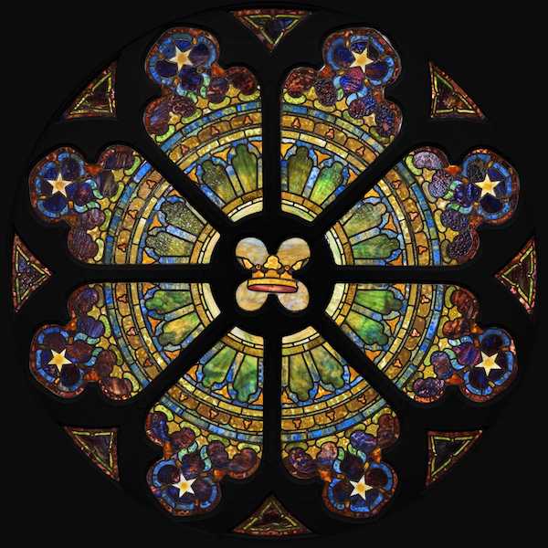 Circa-1905 Tiffany Studios rose window, created for St. Paul’s Presbyterian Church in Pennsylvania, centered on the image of a crown representing Christ, estimated at $150,000-$250,000