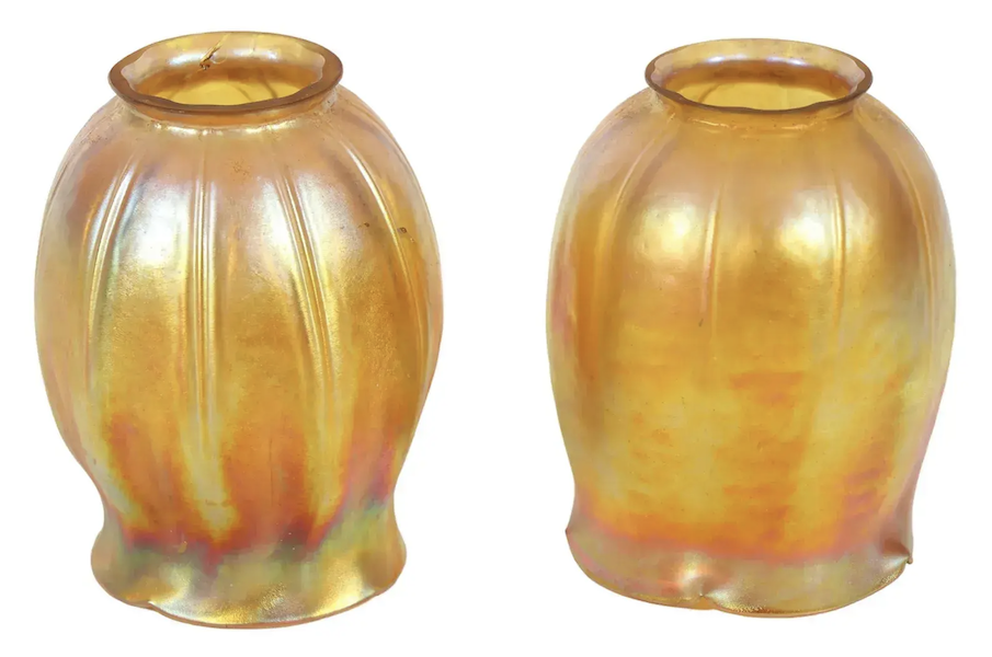 Detail of the Louis Comfort Tiffany shades that enhance the circa-1920 Armand Albert Rateau gilt bronze swan-form sconces, estimated at $8,000-$12,000. Image courtesy of Hill Auction Gallery and LiveAuctioneers