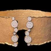 I. Reiss 14K gold and diamond pave cuff bracelet, hammer price of $1,900