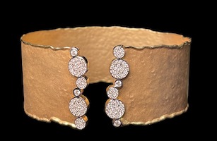 I. Reiss 14K gold and diamond pave cuff bracelet, hammer price of $1,900
