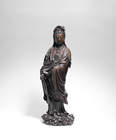 Late Ming dynasty silver-inlaid bronze figure of Guanyin, £214,500. Image courtesy of Bonhams