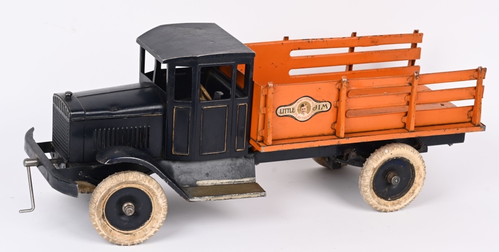 Very scarce Kingsbury motor-driven pressed-steel stake-bed truck, 25in long, with excellent paint, original white rubber tires, and J.C. Penney ‘Little Jim’ decals. Estimate $2,500-$3,500
