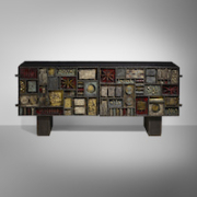 Paul Evans sculpture front cabinet, estimated at $75,000-$95,000. Image courtesy of Rago Arts and Auction Center
