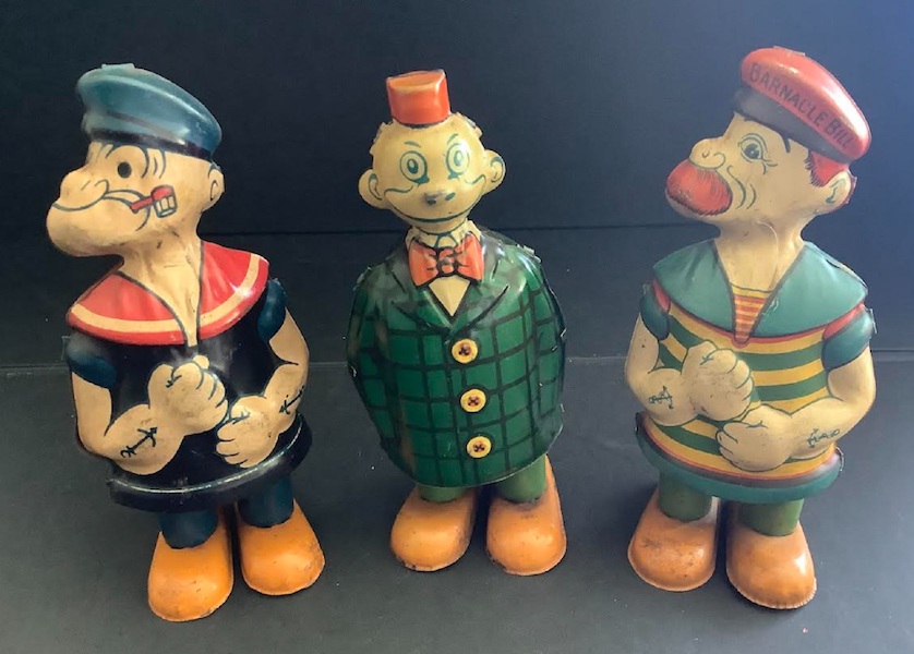 Trio of tin litho windup toys of Popeye, Happy Hooligan and Barnicle Bill, together estimated at $2,500-$3,500