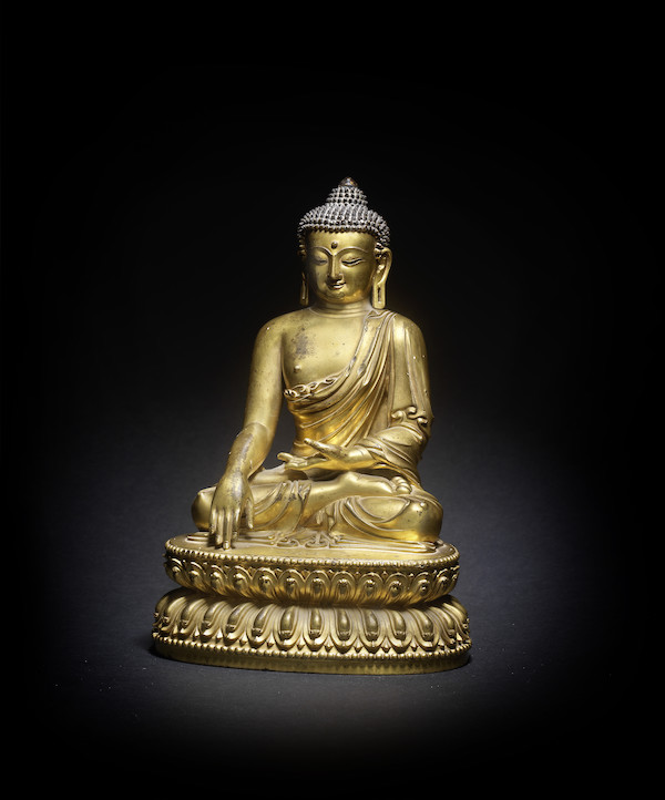 Gilt-bronze figure of Shakyamuni Buddha, £806,700. Image courtesy of Bonhams