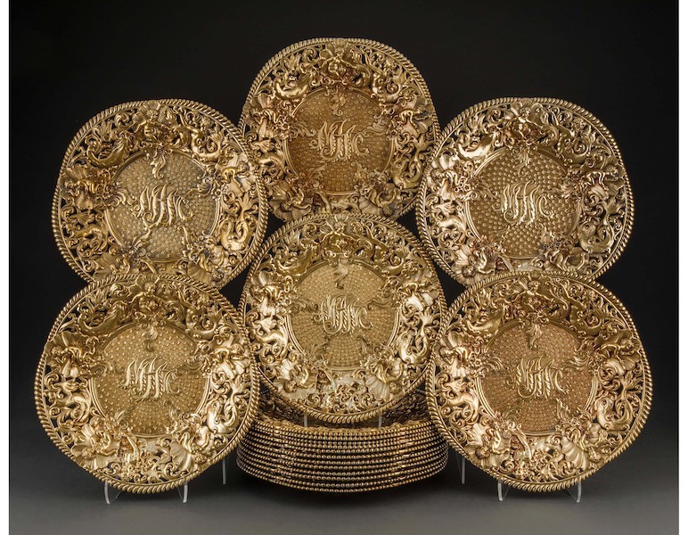 Set of 18 Tiffany & Co. gilt silver plates, $17,500. Image courtesy of Heritage Auctions, ha.com