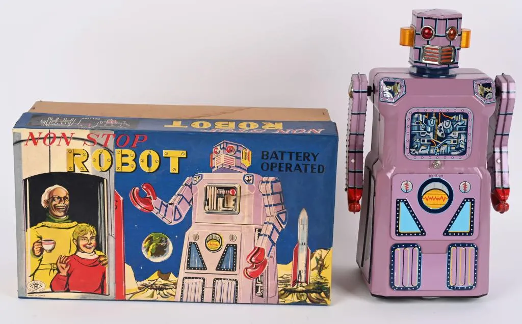 Stunning example of Masudaya's Non Stop, or 'Lavender,' Robot with its original box (some restoration). Estimate $4,000-$6,000