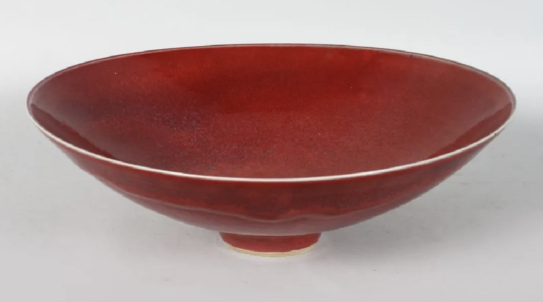 A circular bowl with a flambe glaze and a small footed base by British studio ceramicist Rupert Spira went for £1,900 (roughly $2,300) plus the buyer’s premium in April 2018. Image courtesy of John Nicholson Auctioneers and LiveAuctioneers