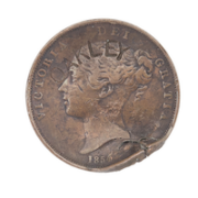 Souvenir coin shot by Annie Oakley, estimated at £500-£800. Image courtesy of Bonhams