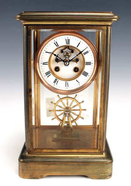 Ship’s wheel crystal regulator mantel clock, estimated at $2,000-$4,000 