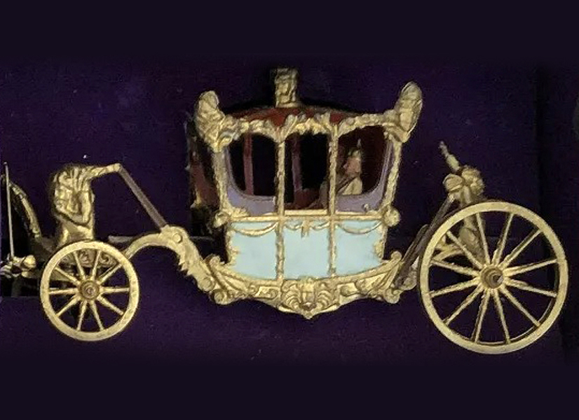 Detail from the Queen Elizabeth II Coronation set by Britains, #2081, showing the young monarch riding in a royal carriage. The set to which it belongs achieved $9,000 plus the buyer’s premium in April 2021. Image courtesy of Old Toy Soldier Auctions USA and LiveAuctioneers.