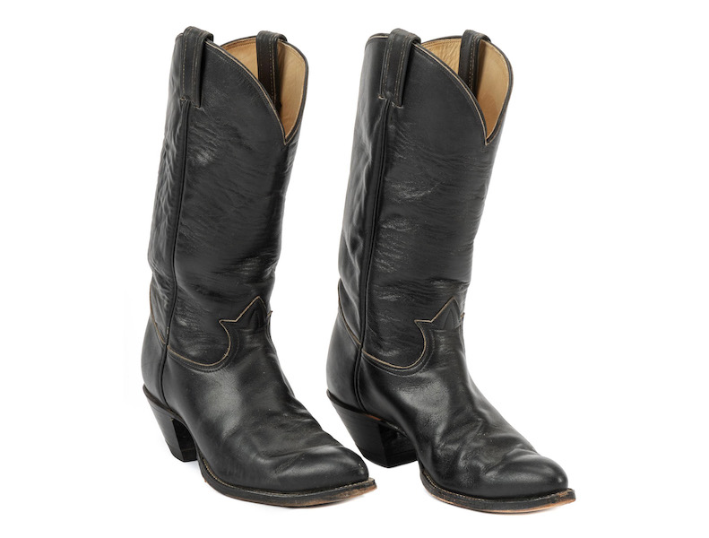 Larry McMurtry’s Tony Lama black leather cowboy boots, estimated at $400-$800. Image courtesy of Vogt Auction Galleries