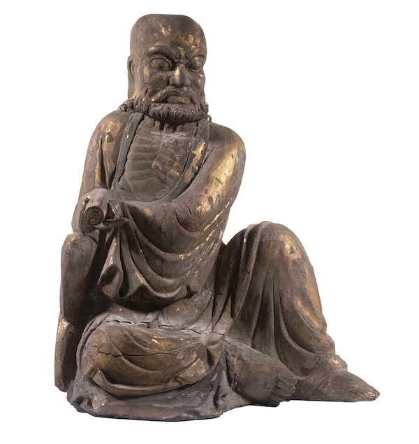 17th-century giltwood figure of a seated ascetic, estimated at $5,000-$7,000. Image courtesy of Thomaston Place Auction Galleries